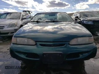 1995 Ford Thunderbird LX with VIN 1FALP62W6SH174680, listed as a Copart auction lot 42637875 with 91,207 mi miles and Clean Title. Bid and sale history available at DreamBid. Image 5.