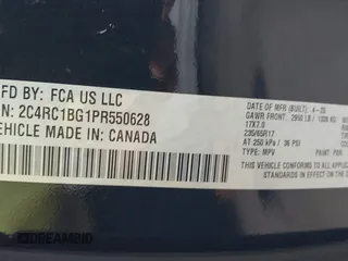 2023 Chrysler Pacifica Touring L with VIN 2C4RC1BG1PR550628, listed as a IAAI auction lot 42553430 with 61,773 mi miles and . Bid and sale history available at DreamBid. Image 9.