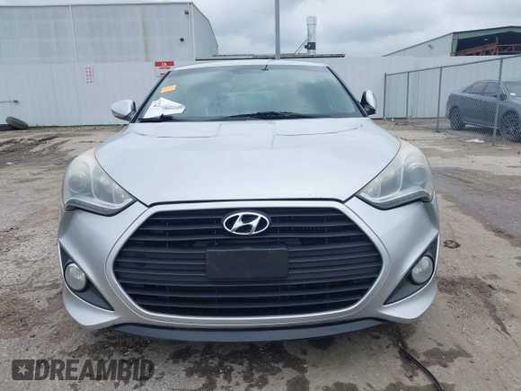 2013 Hyundai Veloster Turbo z VIN KMHTC6AE2DU122273, wystawiony jako IAAI lot #42174272 z przebiegiem 157 152 mil mil oraz . Historia ofert i sprzedaży dostępna na DreamBid. Obrazek 13.