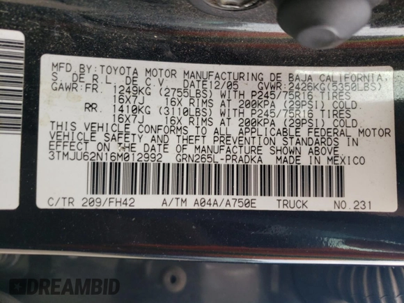 2006 Toyota Tacoma PreRunner z VIN 3TMJU62N16M012992, wystawiony jako Copart lot #55674465 z przebiegiem 290 248 mil mil oraz Szkoda całkowita • Salvage title. Historia ofert i sprzedaży dostępna na DreamBid. Obrazek 13.