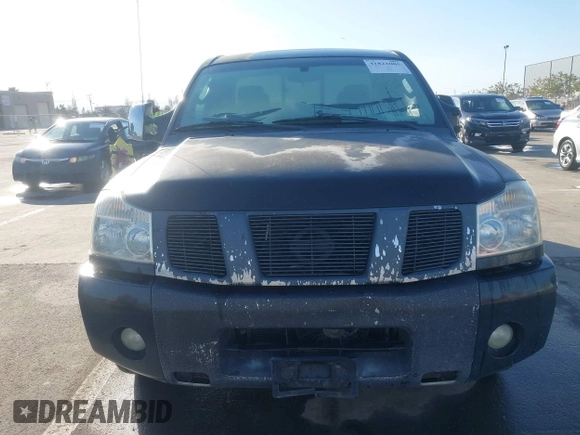 2004 Nissan Titan SE with VIN 1N6AA06A14N574940, listed as a IAAI auction lot 41821005 with 202,373 mi miles. Bid and sale history available at carsss.com. Image 12.