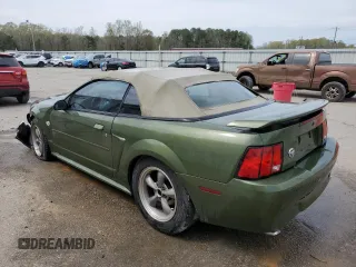 2004 Ford Mustang Deluxe with VIN 1FAFP44694F133635, listed as a Copart auction lot 50216915 with 0 mi miles and Salvage Title. Bid and sale history available at carsss.com. Image 2.