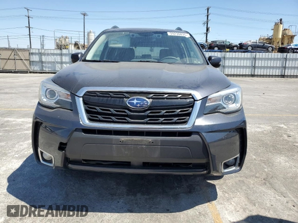 2017 Subaru Forester Touring with VIN JF2SJGWC1HH476823, listed as a Copart auction lot 59230835 with 107,711 mi miles and Salvage title. Bid and sale history available at DreamBid. Image 5.