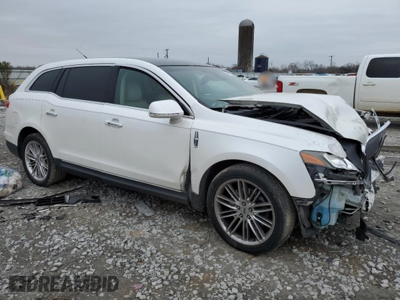 2014 Lincoln MKT EcoBoost with VIN 2LMHJ5ATXEBL50487, listed as a Copart auction lot 46649885 with 187,261 mi miles and Salvage Title. Bid and sale history available at DreamBid. Image 4.