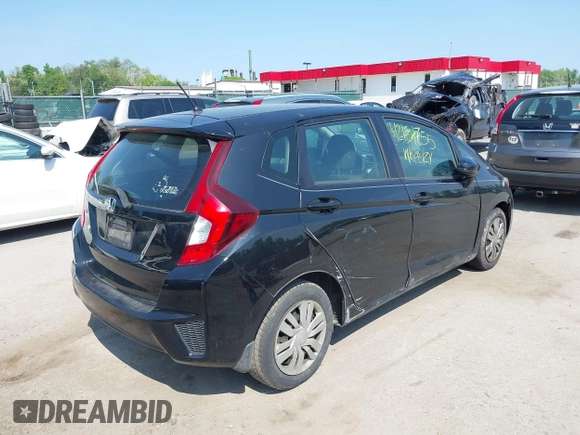 2015 Honda Fit LX z VIN 3HGGK5H51FM724566, wystawiony jako IAAI lot #42151755 z przebiegiem 168 744 mil mil oraz . Historia ofert i sprzedaży dostępna na DreamBid. Obrazek 4.