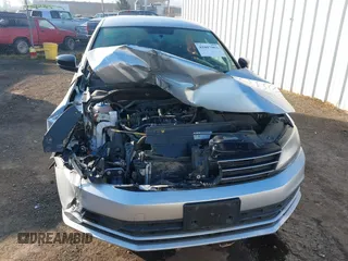 2015 Volkswagen Jetta SE z VIN 3VWD17AJ6FM257858, wystawiony jako IAAI lot #41007963 z przebiegiem 165 064 mil mil oraz . Historia ofert i sprzedaży dostępna na DreamBid. Obrazek 12.