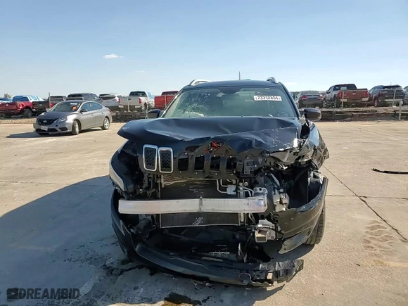 2019 Jeep Cherokee Latitude Plus with VIN 1C4PJLLXXKD144303, listed as a Copart auction lot 73312804 with 119,766 mi miles and Salvage Title. Bid and sale history available at carsss.com. Image 11.