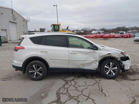2018 Toyota RAV4 XLE with VIN JTMRFREV6JJ734927, listed as a IAAI auction lot 41510616 with 119,687 mi miles. Bid and sale history available at carsss.com. Image 13.