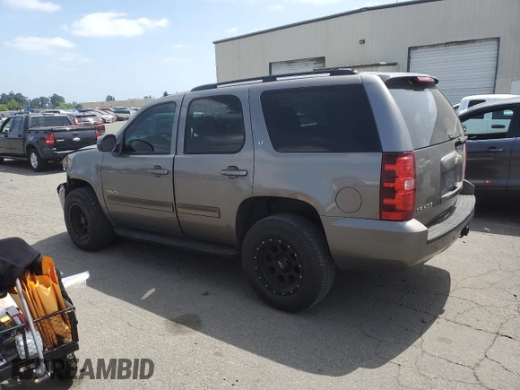 2011 Chevrolet Tahoe LT with VIN 1GNSKBE0XBR348160, listed as a Copart auction lot 60159825 with 227,202 mi miles and Salvage title. Bid and sale history available at DreamBid. Image 2.