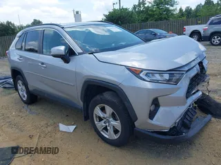 2019 Toyota RAV4 XLE with VIN 2T3P1RFV1KW057597, listed as a IAAI auction lot 42682610 with Not provided miles and . Bid and sale history available at DreamBid. Image 1.