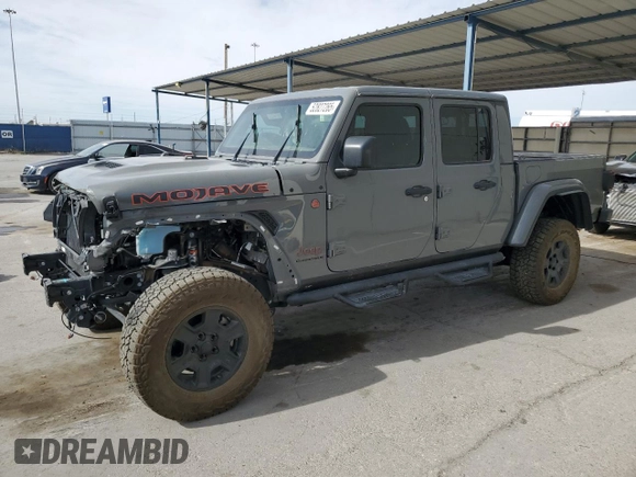 2023 Jeep Gladiator Mojave z VIN 1C6JJTEG7PL548084, wystawiony jako Copart lot #52827265 z przebiegiem 26 789 mil mil oraz Czysty tytuł • Clean title. Historia ofert i sprzedaży dostępna na DreamBid. Obrazek 1.
