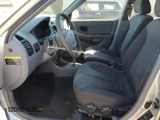 2003 Hyundai Accent GL with VIN KMHCG45CX3U488238, listed as a Copart auction lot 74399014 with 130,915 mi miles and Clean Title. Bid and sale history available at carsss.com. Image 7.