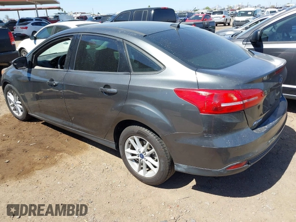 2018 Ford Focus SE with VIN 1FADP3FE6JL270910, listed as a IAAI auction lot 42130371 with 121,240 mi miles. Bid and sale history available at carsss.com. Image 3.