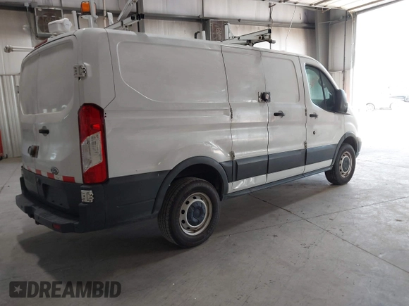 2015 Ford Transit Cargo with VIN 1FTNR1ZM2FKA55134, listed as a IAAI auction lot 42193601 with 96,231 mi miles and . Bid and sale history available at DreamBid. Image 4.