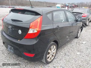 2012 Hyundai Accent SE with VIN KMHCU5AE7CU031523, listed as a IAAI auction lot 41519387 with 196,272 mi miles. Bid and sale history available at carsss.com. Image 4.