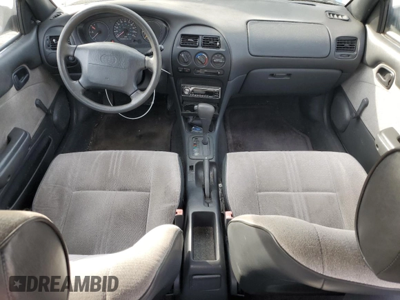 1996 Geo Prizm LSi z VIN 1Y1SK5262TZ041811, wystawiony jako Copart lot #56417875 z przebiegiem 185 771 mil mil oraz Tytuł czysty. Historia ofert i sprzedaży dostępna na DreamBid. Obrazek 8.