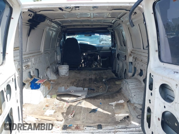 1999 Ford Econoline Cargo with VIN 1FTRE1421XHA35992, listed as a IAAI auction lot 42008448 with 293,689 mi miles and . Bid and sale history available at carsss.com. Image 8.