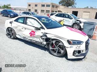 2018 Audi RS 5 z VIN WUAPWAF55JA903152, wystawiony jako IAAI lot #42193996 z przebiegiem 95 730 mil mil oraz . Historia ofert i sprzedaży dostępna na DreamBid. Obrazek 1.
