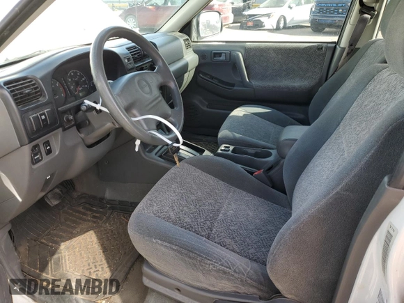 2000 Isuzu Rodeo S z VIN 4S2CK58W2Y4317915, wystawiony jako Copart lot #81780094 z przebiegiem 158 217 mil mil oraz Szkoda całkowita • Salvage title. Historia ofert i sprzedaży dostępna na DreamBid. Obrazek 7.