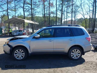 2012 Subaru Forester X Premium with VIN JF2SHBDC4CH445642, listed as a IAAI auction lot 41865977 with 136,838 mi miles and . Bid and sale history available at DreamBid. Image 14.