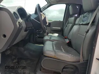 2007 Ford F-150 XL with VIN 1FTRF12W97KC13119, listed as a Copart auction lot 60927195 with 208,316 mi miles and Salvage title. Bid and sale history available at DreamBid. Image 7.