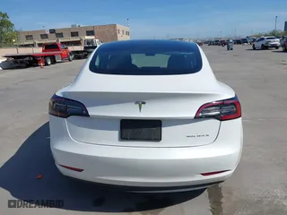 2022 Tesla Model 3 Long Range with VIN 5YJ3E1EB3NF179304, listed as a IAAI auction lot 42003380 with 46,759 mi miles. Bid and sale history available at carsss.com. Image 16.