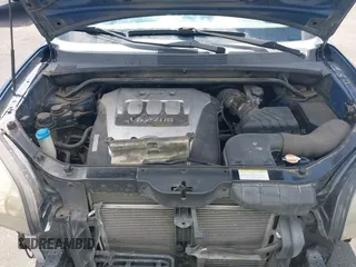2005 Hyundai Tucson GLS with VIN KM8JN12D45U132721, listed as a IAAI auction lot 42213518 with 153,491 mi miles. Bid and sale history available at carsss.com. Image 10.