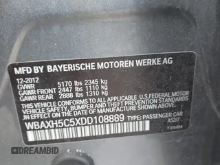 2013 BMW 5 Series 528i xDrive with VIN WBAXH5C5XDD108889, listed as a IAAI auction lot 41620024 with 103,542 mi miles. Bid and sale history available at carsss.com. Image 9.