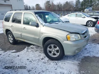 2006 Mazda Tribute LX with VIN 4F2YZ94126KM09467, listed as a IAAI auction lot 41324941 with 116,519 mi miles and . Bid and sale history available at carsss.com. Image 1.