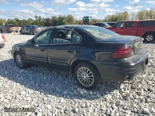 1999 Pontiac Grand Am SE2 with VIN 1G2NE52E2XM732523, listed as a Copart auction lot 75420684 with 124,110 mi miles and Salvage Title. Bid and sale history available at carsss.com. Image 2.
