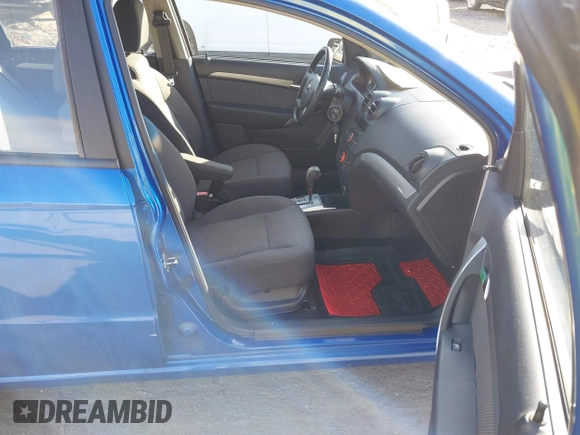 2009 Chevrolet Aveo 1LT with VIN KL1TD56E49B666742, listed as a IAAI auction lot 40585197 with 60,859 mi miles and . Bid and sale history available at DreamBid. Image 5.
