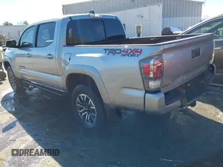 2023 Toyota Tacoma 4WD SR with VIN 3TYCZ5AN7PT122067, listed as a IAAI auction lot 41624047 with 27,483 mi miles. Bid and sale history available at carsss.com. Image 3.