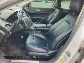 2016 Lincoln MKZ z VIN 3LN6L2G90GR616997, wystawiony jako Copart lot #62917525 z przebiegiem 194 744 mil mil oraz Szkoda całkowita • Salvage title. Historia ofert i sprzedaży dostępna na DreamBid. Obrazek 7.