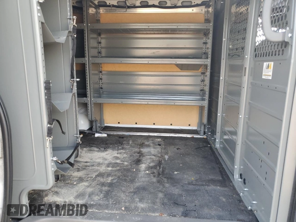 2021 Nissan NV Cargo SV с VIN 1N6BF0KY3MN806785, выставлен на аукционе Copart как лот 77234424 с пробегом 105 784 миль миль и Списание • Salvage title. История ставок и продаж доступна на DreamBid. Изображение 11.