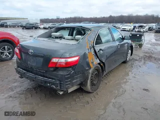 2008 Toyota Camry LE with VIN 4T1BK46K68U067348, listed as a IAAI auction lot 41469784 with 154,513 mi miles. Bid and sale history available at carsss.com. Image 4.