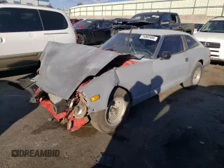 1983 Datsun 280ZX 2+2 z VIN JN1HZ06S2DX506351, wystawiony jako Copart lot #74302484 z przebiegiem 17 211 mil mil oraz Szkody całkowita. Historia ofert i sprzedaży dostępna na DreamBid. Obrazek 1.