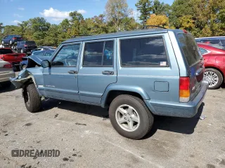 1998 Jeep Cherokee Sport with VIN 1J4FT68S4WL121559, listed as a Copart auction lot 77387794 with 163,453 mi miles and Salvage Title. Bid and sale history available at carsss.com. Image 2.