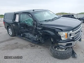 2018 Ford F-150 XL with VIN 1FTEW1E5XJKC37082, listed as a IAAI auction lot 42335721 with 167,401 mi miles and . Bid and sale history available at DreamBid. Image 1.