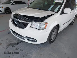 2013 Chrysler Town & Country Touring with VIN 2C4RC1BG0DR675406, listed as a IAAI auction lot 42119645 with 166,679 mi miles and . Bid and sale history available at DreamBid. Image 6.
