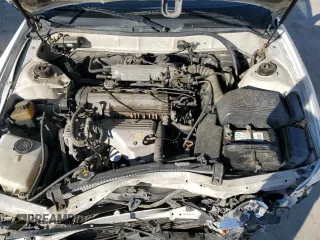 1992 Toyota Camry LE z VIN 4T1SK12E8NU044387, wystawiony jako Copart lot #43195915 z przebiegiem 279 199 mil mil oraz Szkoda całkowita • Salvage title. Historia ofert i sprzedaży dostępna na DreamBid. Obrazek 13.