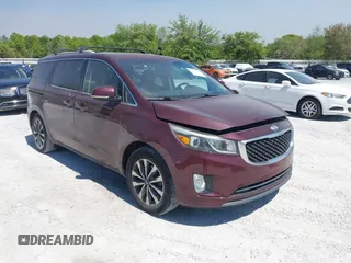 2015 Kia Sedona EX with VIN KNDMC5C19F6018139, listed as a IAAI auction lot 42031165 with 136,484 mi miles. Bid and sale history available at carsss.com. Image 1.