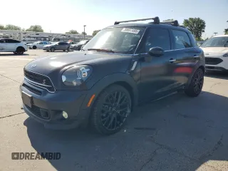 2015 MINI Countryman S z VIN WMWZC3C50FWT02673, wystawiony jako Copart lot #55607495 z przebiegiem 68 372 mil mil oraz Szkoda całkowita • Salvage title. Historia ofert i sprzedaży dostępna na DreamBid. Obrazek 1.