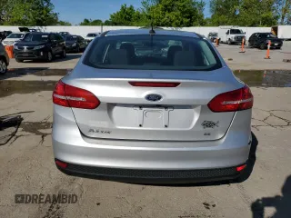 2017 Ford Focus SE z VIN 1FADP3F29HL339332, wystawiony jako Copart lot #56556735 z przebiegiem 93 050 mil mil oraz Szkoda całkowita • Salvage title. Historia ofert i sprzedaży dostępna na DreamBid. Obrazek 6.