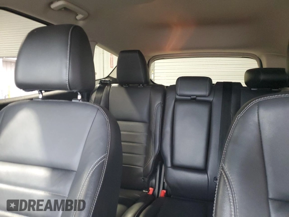 2014 Ford Escape Titanium с VIN 1FMCU0J98EUA35069, выставлен на аукционе Copart как лот 58369635 с пробегом 92 323 миль миль и Списание • Salvage title. История ставок и продаж доступна на DreamBid. Изображение 10.