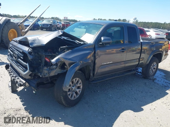 2016 Toyota Tacoma SR with VIN 5TFRX5GN6GX070766, listed as a IAAI auction lot 40461070 with 144,039 mi miles and . Bid and sale history available at DreamBid. Image 2.