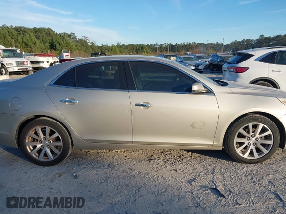 2014 Chevrolet Malibu LTZ with VIN 1G11H5SL9EF299826, listed as a IAAI auction lot 40955208 with 213,203 mi miles and . Bid and sale history available at DreamBid. Image 13.