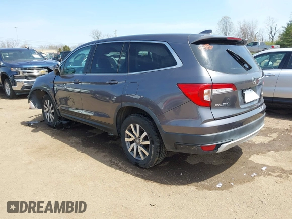 2019 Honda Pilot EX-L with VIN 5FNYF6H55KB082929, listed as a IAAI auction lot 42057611 with 93,532 mi miles and . Bid and sale history available at DreamBid. Image 3.