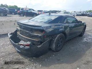 2013 Chevrolet Camaro LS z VIN 2G1FA1E39D9206888, wystawiony jako IAAI lot #42170703 z przebiegiem 169 661 mil mil oraz . Historia ofert i sprzedaży dostępna na DreamBid. Obrazek 4.