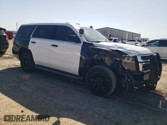 2016 Chevrolet Tahoe Commercial with VIN 1GNLCDEC2GR136559, listed as a Copart auction lot 51077695 with 123,968 mi miles and Salvage title. Bid and sale history available at DreamBid. Image 4.