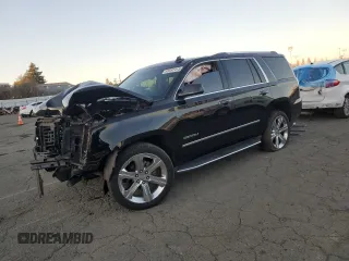 2018 GMC Yukon Denali with VIN 1GKS1CKJ3JR297926, listed as a Copart auction lot 88597415 with 0 mi miles and Salvage Title. Bid and sale history available at carsss.com. Image 1.